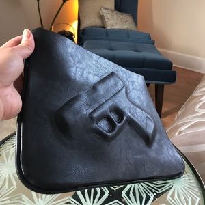 Unique black hand gun clutch